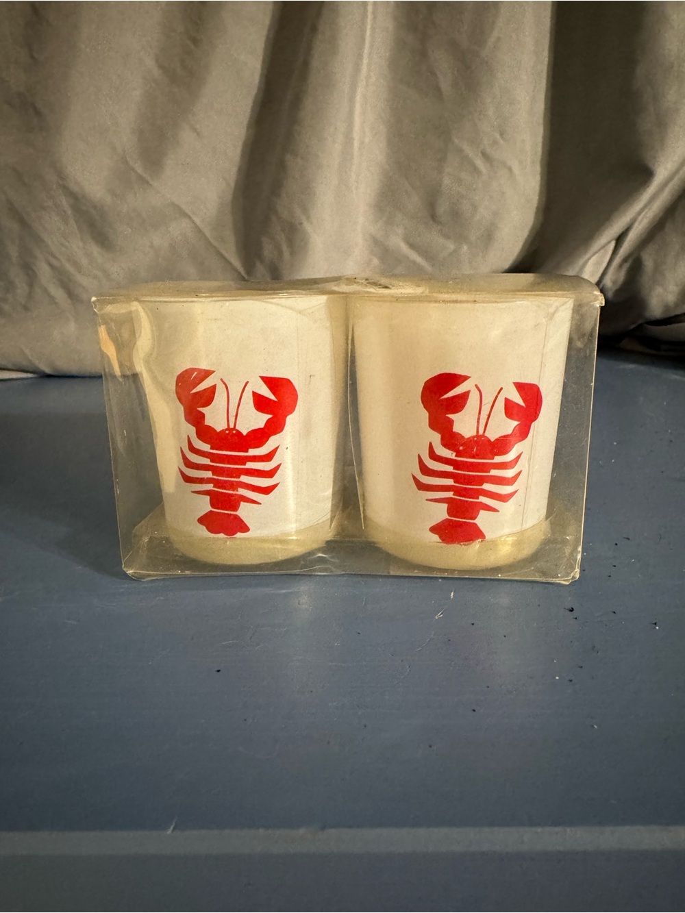 Set of Two White Glass Candle Holders with Red Lobster Design